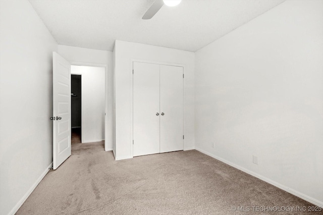 3719 E 84th St, Tulsa, OK 74137 - unfurnished bedroom featuring carpet floors, baseboards, a closet, and ceiling fan