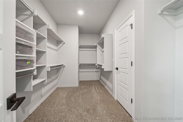 11807 N 131st E Ave, Owasso, OK 74055 - spacious closet featuring carpet floors