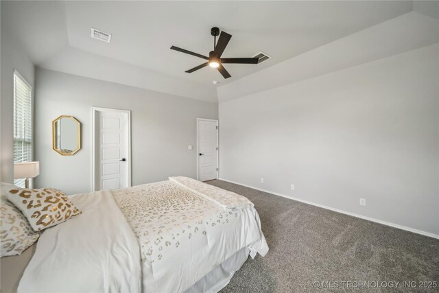 11807 N 131st E Ave, Owasso, OK 74055 - bedroom featuring dark carpet, baseboards, a ceiling fan, and lofted ceiling