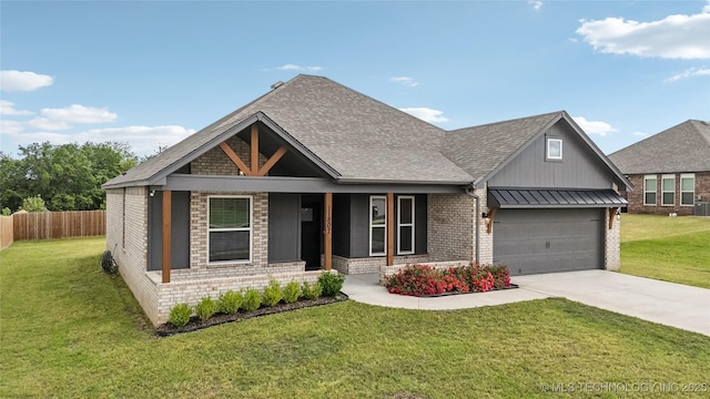11807 N 131st E Ave, Owasso, OK 74055 - craftsman-style home with driveway, covered porch, a garage, brick siding, and board and batten siding