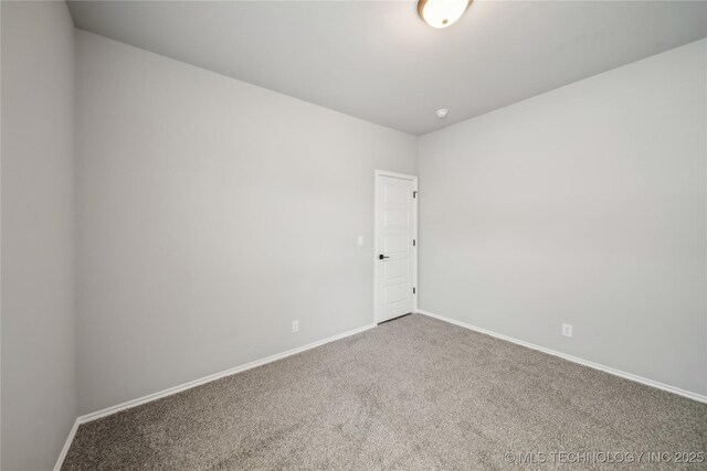 11807 N 131st E Ave, Owasso, OK 74055 - unfurnished room with carpet floors and baseboards