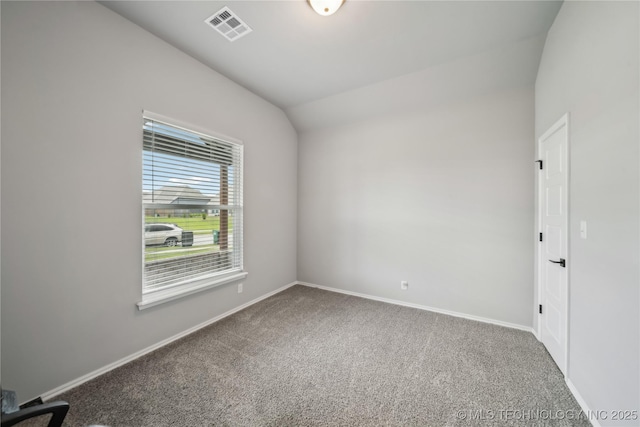 11807 N 131st E Ave, Owasso, OK 74055 - empty room featuring carpet flooring, vaulted ceiling, and baseboards