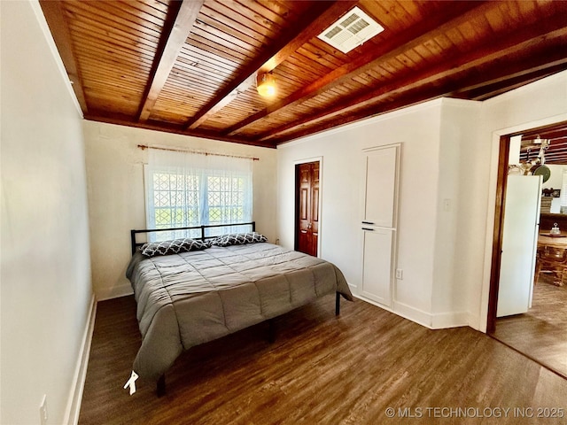 19442 W 929, Cookson, OK 74427 - bedroom featuring beam ceiling, wood ceiling, baseboards, freestanding refrigerator, and wood finished floors