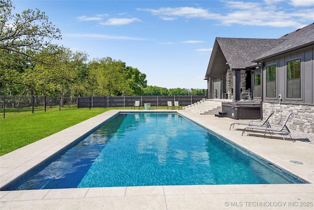 view of swimming pool with a patio