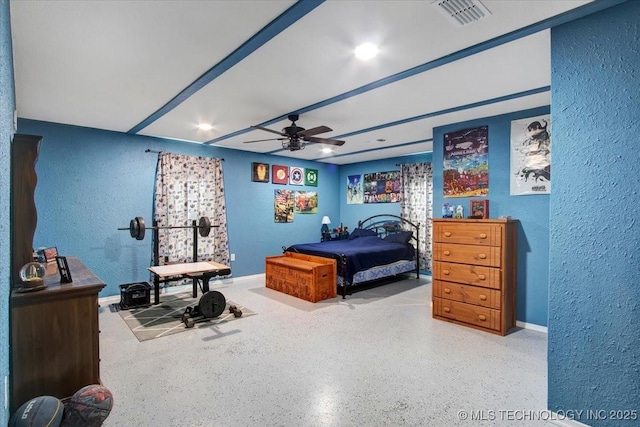10627 Old Willis, Kingston, OK 73439 - bedroom with a textured wall, speckle patterned floor, baseboards, and ceiling fan