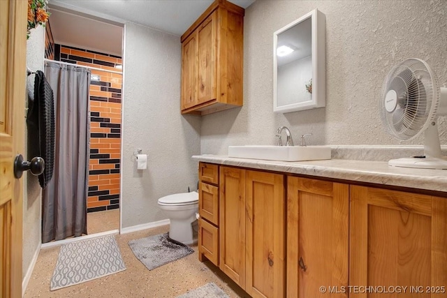 10627 Old Willis, Kingston, OK 73439 - bathroom featuring a textured wall, baseboards, a shower with curtain, toilet, and vanity