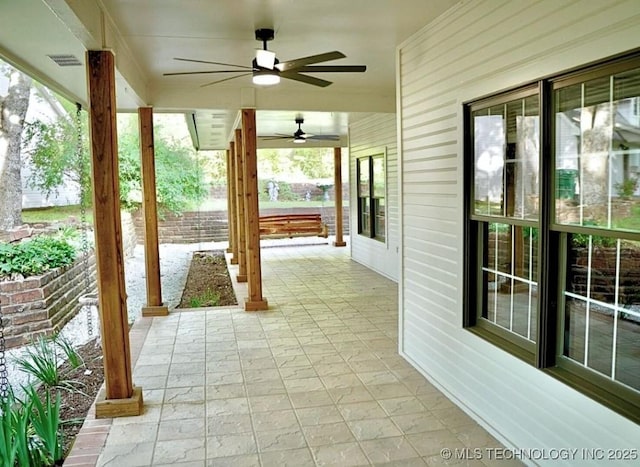 15373 N Javine Hill Rd, Skiatook, OK 74070 - view of patio / terrace featuring ceiling fan