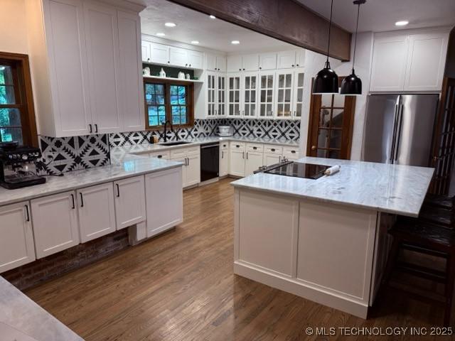 15373 N Javine Hill Rd, Skiatook, OK 74070 - kitchen with black appliances, a sink, decorative backsplash, dark wood-type flooring, and recessed lighting
