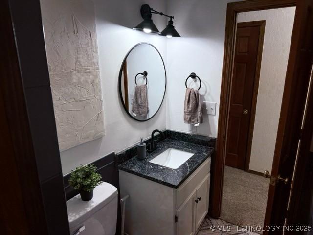 15373 N Javine Hill Rd, Skiatook, OK 74070 - bathroom with vanity and toilet