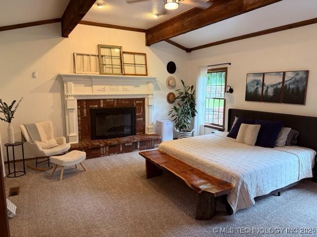 15373 N Javine Hill Rd, Skiatook, OK 74070 - bedroom with carpet floors, a brick fireplace, and crown molding