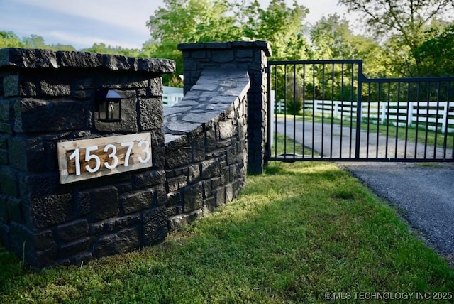 15373 N Javine Hill Rd, Skiatook, OK 74070 - community sign with a gate