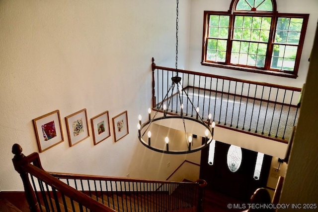 15373 N Javine Hill Rd, Skiatook, OK 74070 - staircase featuring a chandelier
