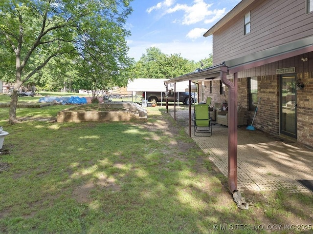 311 Washington Ave, Boswell, OK 74727 - view of grassy yard with a detached carport