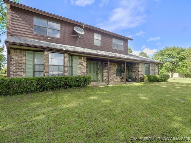 311 Washington Ave, Boswell, OK 74727 - view of front of home with brick siding and a front lawn