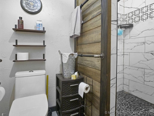 311 Washington Ave, Boswell, OK 74727 - bathroom with a tile shower and toilet