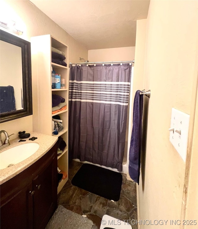 1715 Worley, Durant, OK 74701 - full bath featuring vanity and a shower with curtain