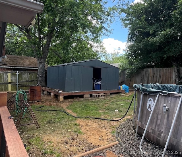 1715 Worley, Durant, OK 74701 - fenced backyard with a shed and an outbuilding