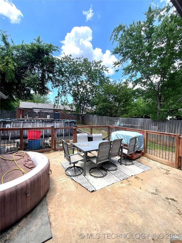 1715 Worley, Durant, OK 74701 - view of patio with a fenced backyard and outdoor dining area