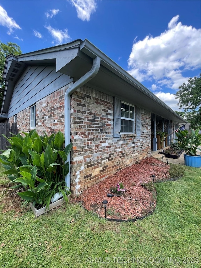 1715 Worley, Durant, OK 74701 - view of home's exterior with brick siding