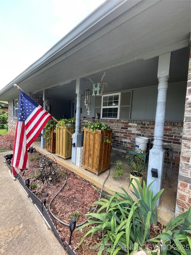 1715 Worley, Durant, OK 74701 - view of patio / terrace with a porch