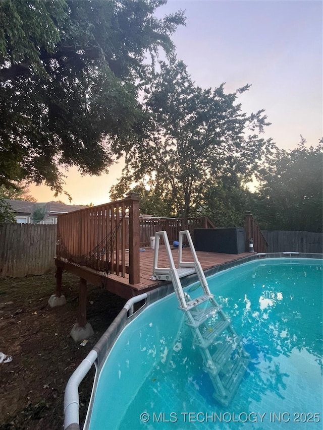 1715 Worley, Durant, OK 74701 - view of pool with a wooden deck