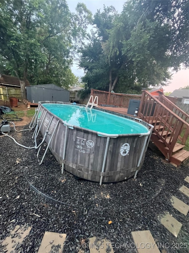 1715 Worley, Durant, OK 74701 - view of pool with a wooden deck