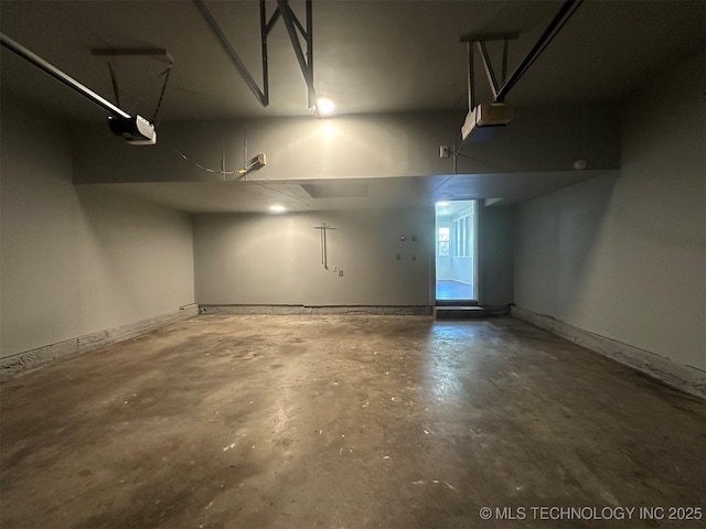 6112 E 21st St, Tulsa, OK 74114 - garage featuring a garage door opener