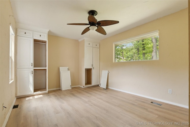 1403 Vale, Grove, OK 74344 - unfurnished bedroom with light wood-type flooring, baseboards, and ceiling fan