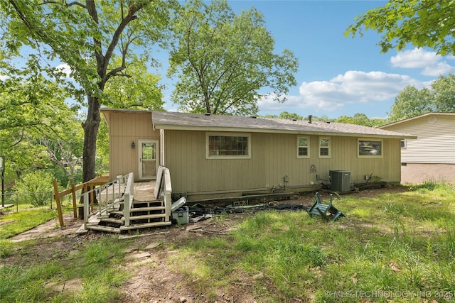 1403 Vale, Grove, OK 74344 - rear view of property featuring central air condition unit