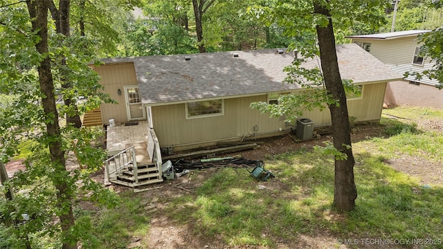 1403 Vale, Grove, OK 74344 - rear view of property with a shingled roof and central air condition unit
