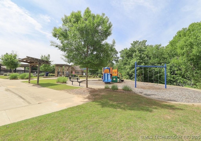 community playground with a lawn and a pergola