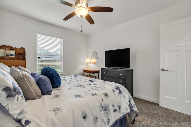 2621 S Catalayah Ln, Claremore, OK 74019 - bedroom with carpet flooring, a ceiling fan, and baseboards
