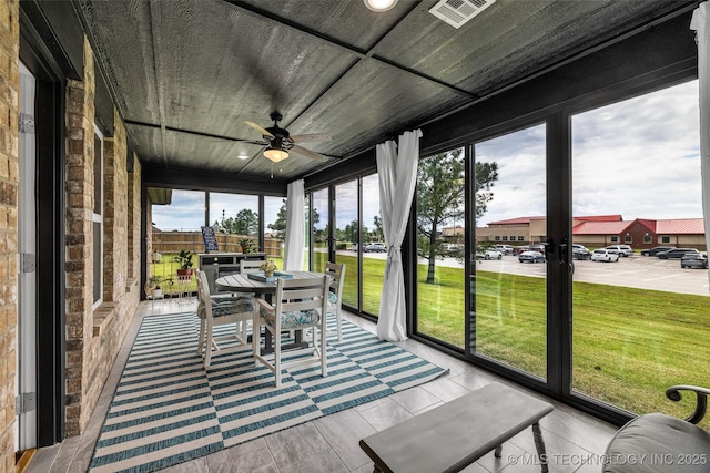 2621 S Catalayah Ln, Claremore, OK 74019 - sunroom / solarium with ceiling fan and outdoor dining space