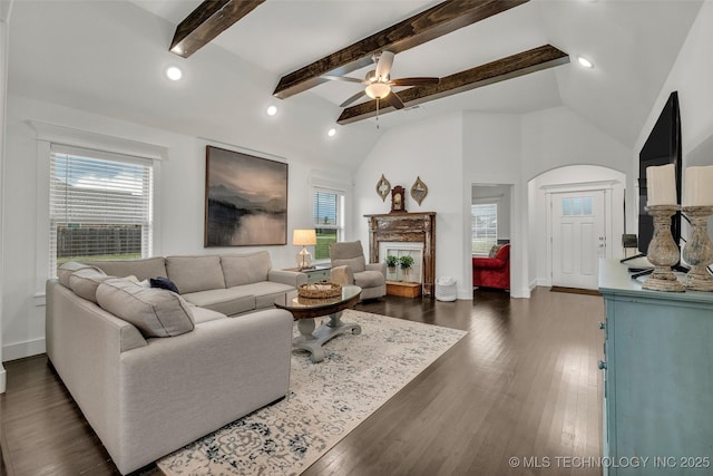 2621 S Catalayah Ln, Claremore, OK 74019 - living room featuring plenty of natural light, ceiling fan, a fireplace, dark wood-style floors, and recessed lighting