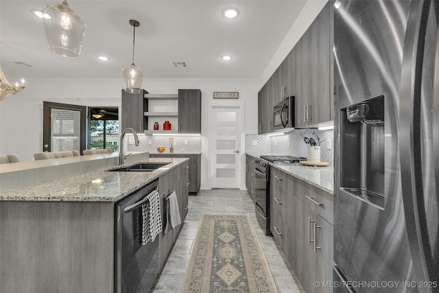 2621 S Catalayah Ln, Claremore, OK 74019 - kitchen featuring appliances with stainless steel finishes, open shelves, modern cabinets, a sink, and decorative backsplash