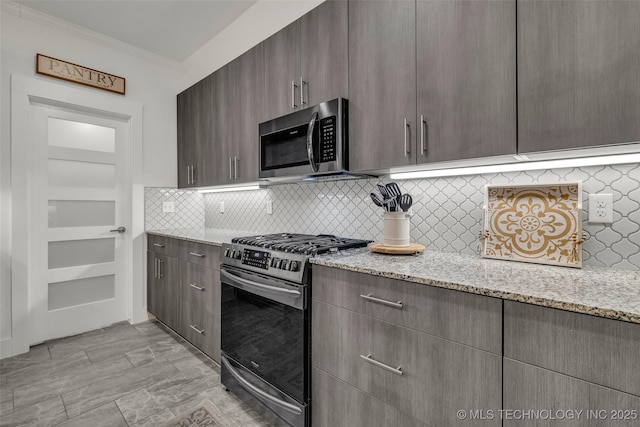 2621 S Catalayah Ln, Claremore, OK 74019 - kitchen featuring appliances with stainless steel finishes, decorative backsplash, light stone countertops, ornamental molding, and modern cabinets