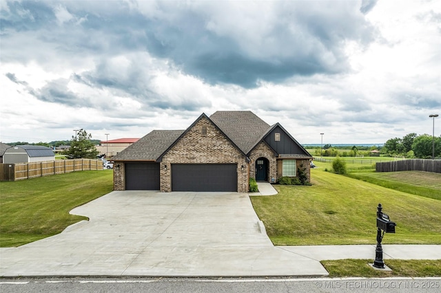 2621 S Catalayah Ln, Claremore, OK 74019 - view of front of home featuring an attached garage, driveway, brick siding, and roof with shingles