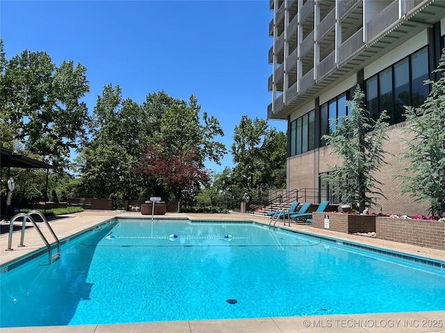 community pool featuring fence