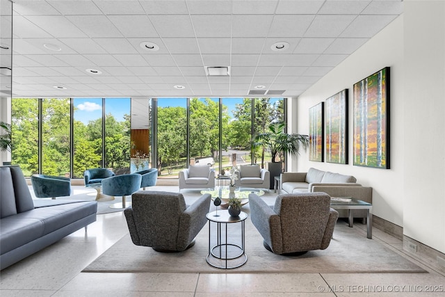 lobby with expansive windows and recessed lighting