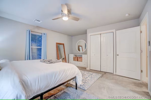 555 Williams Dr, Eufaula, OK 74432 - bedroom featuring concrete flooring, a closet, and a ceiling fan