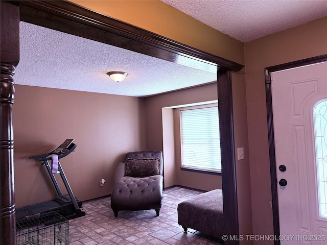 2902 Hilltop Ave, Muskogee, OK 74403 - foyer with a textured ceiling and baseboards