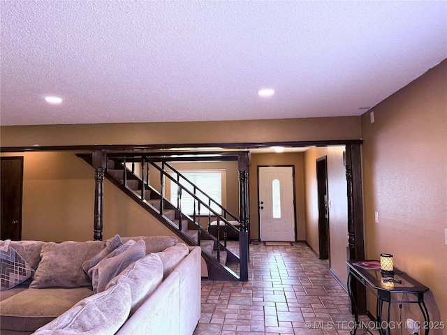 2902 Hilltop Ave, Muskogee, OK 74403 - living room featuring stairway, a textured ceiling, and recessed lighting