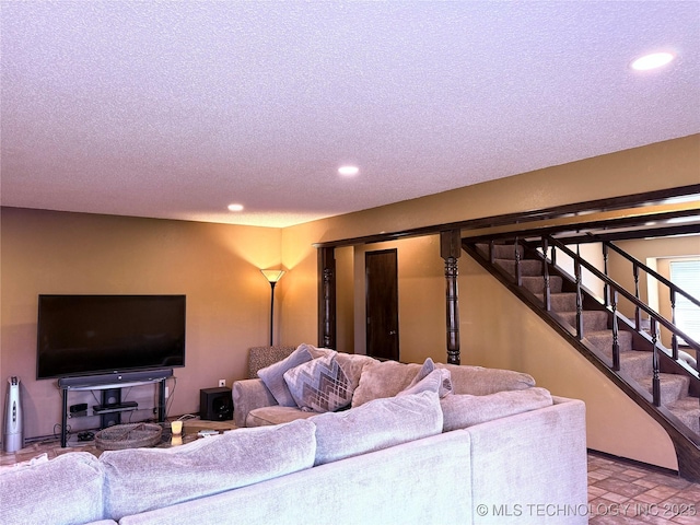 2902 Hilltop Ave, Muskogee, OK 74403 - living room featuring recessed lighting, a textured ceiling, and stairway