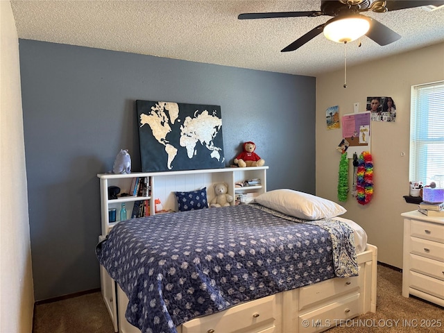 2902 Hilltop Ave, Muskogee, OK 74403 - bedroom with carpet, a textured ceiling, and ceiling fan