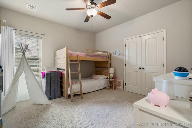 4415 S 187th E Pl, Tulsa, OK 74134 - carpeted bedroom with a closet and a ceiling fan