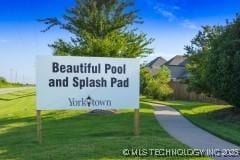 118 W 130th Pl S, Jenks, OK 74037 - community sign with a yard