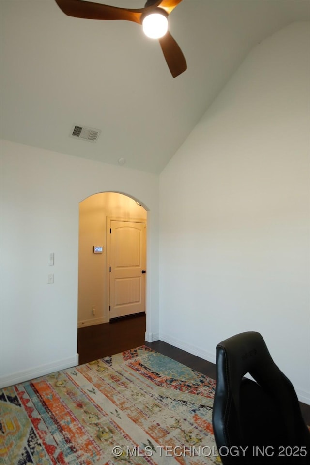 118 W 130th Pl S, Jenks, OK 74037 - bedroom with vaulted ceiling, arched walkways, ceiling fan, and baseboards