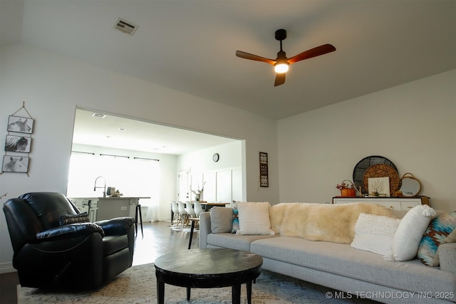 118 W 130th Pl S, Jenks, OK 74037 - living area with wood finished floors and a ceiling fan