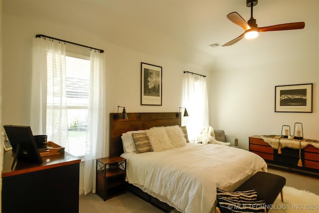 118 W 130th Pl S, Jenks, OK 74037 - bedroom featuring light carpet, multiple windows, and a ceiling fan
