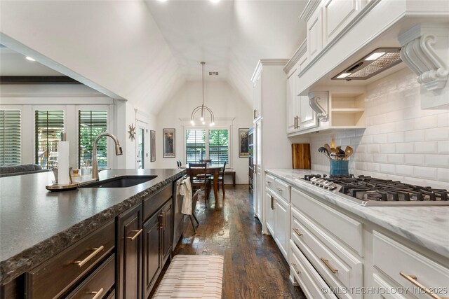 2835 E 104th St, Tulsa, OK 74137 - kitchen featuring a sink, white cabinetry, stainless steel appliances, dark wood-style flooring, and decorative backsplash